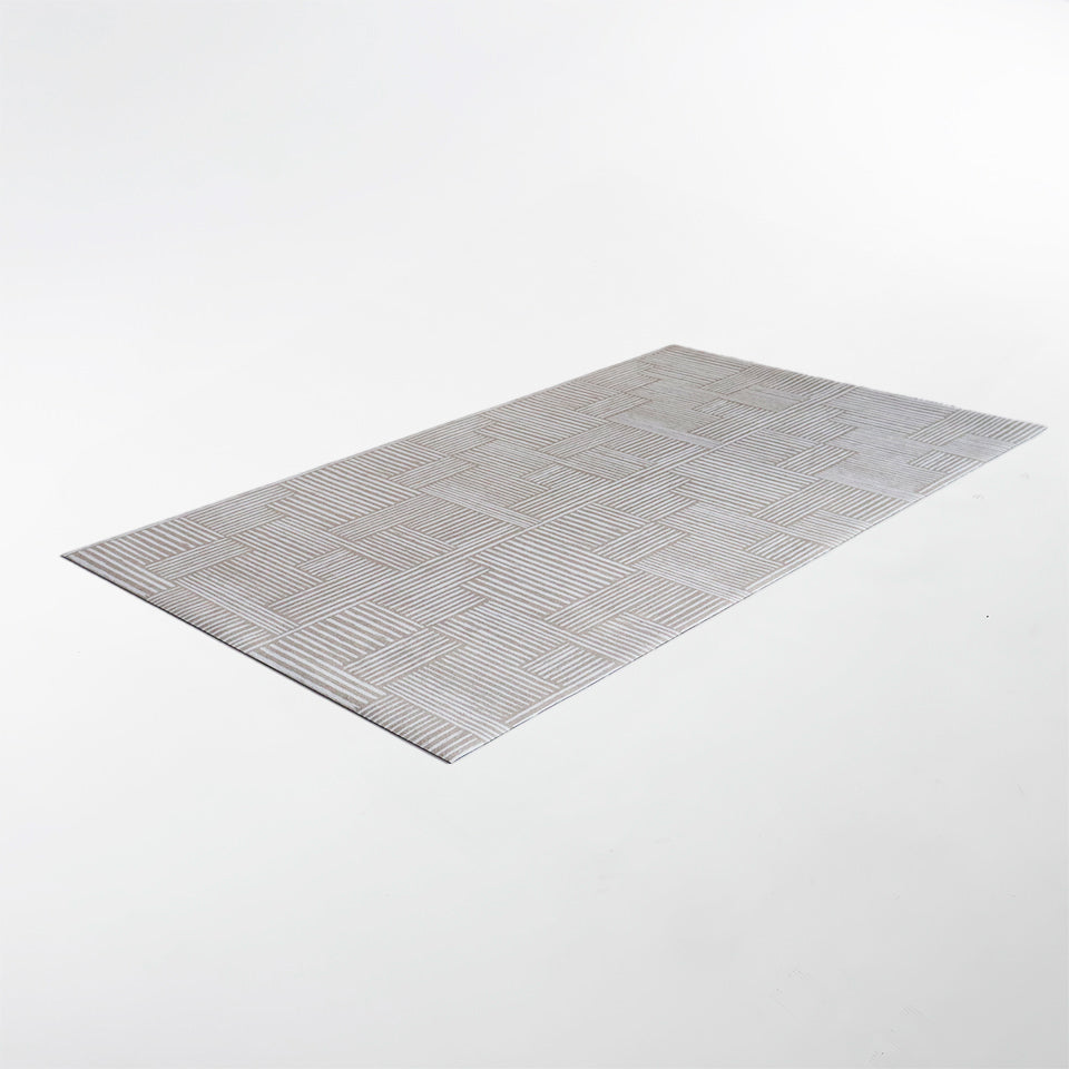 Shiitake tan background with snowbound cream colored organic lines in abstract square pattern on a low profile washable interior floor mat.