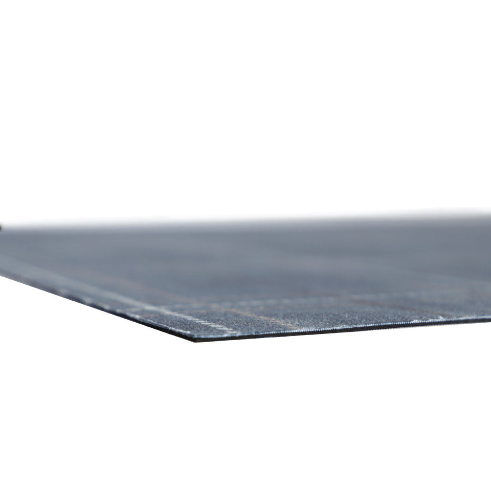 Low profile shot of Storm Cloud blue printed linen texture with shiitake tan and urbane bronze plaid stripes on a low profile washable indoor floor mat