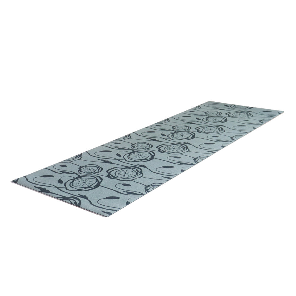 Peonies in a repeating pattern with storm cloud blue and sea salt background and peonies in snowbound cream on a washable indoor floor mat.