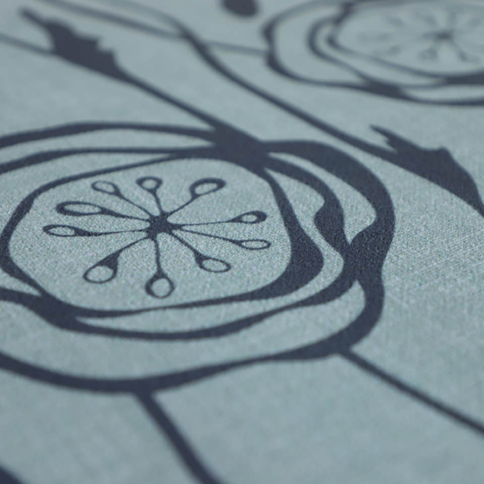 Peonies in a repeating pattern with storm cloud blue and sea salt  background and peonies in snowbound cream on a washable indoor floor mat.