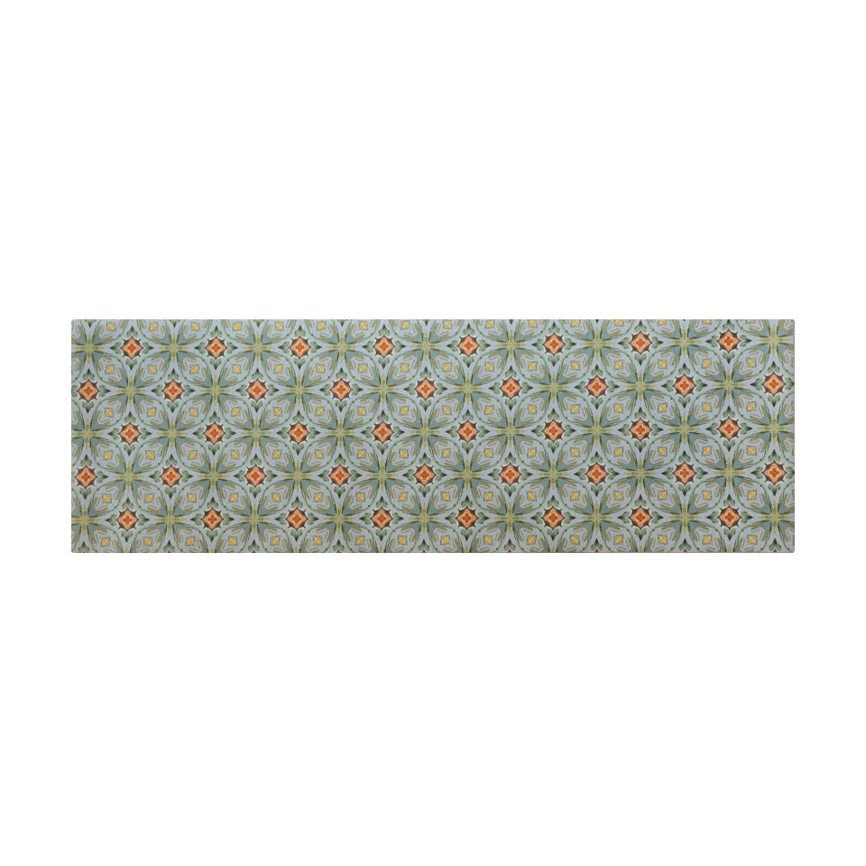 Kitchen runner sized Neutral kaleidoscope pattern in aquas, apple green, and hints of orange on this low profile washable interior floor mat.