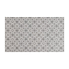 Neutral kaleidoscope pattern in shiitake tan and urbane bronze brown with touches of storm cloud blue on this low profile washable interior floor mat.