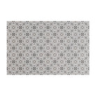 Neutral kaleidoscope pattern in shiitake tan and urbane bronze brown with touches of storm cloud blue on this low profile washable interior floor mat.