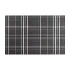 Un-Rug's Sydney Plaid mat in the size small with a traditional plaid design on a greyish brown background.