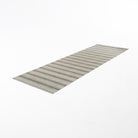 long thin runner with beige and green stripes