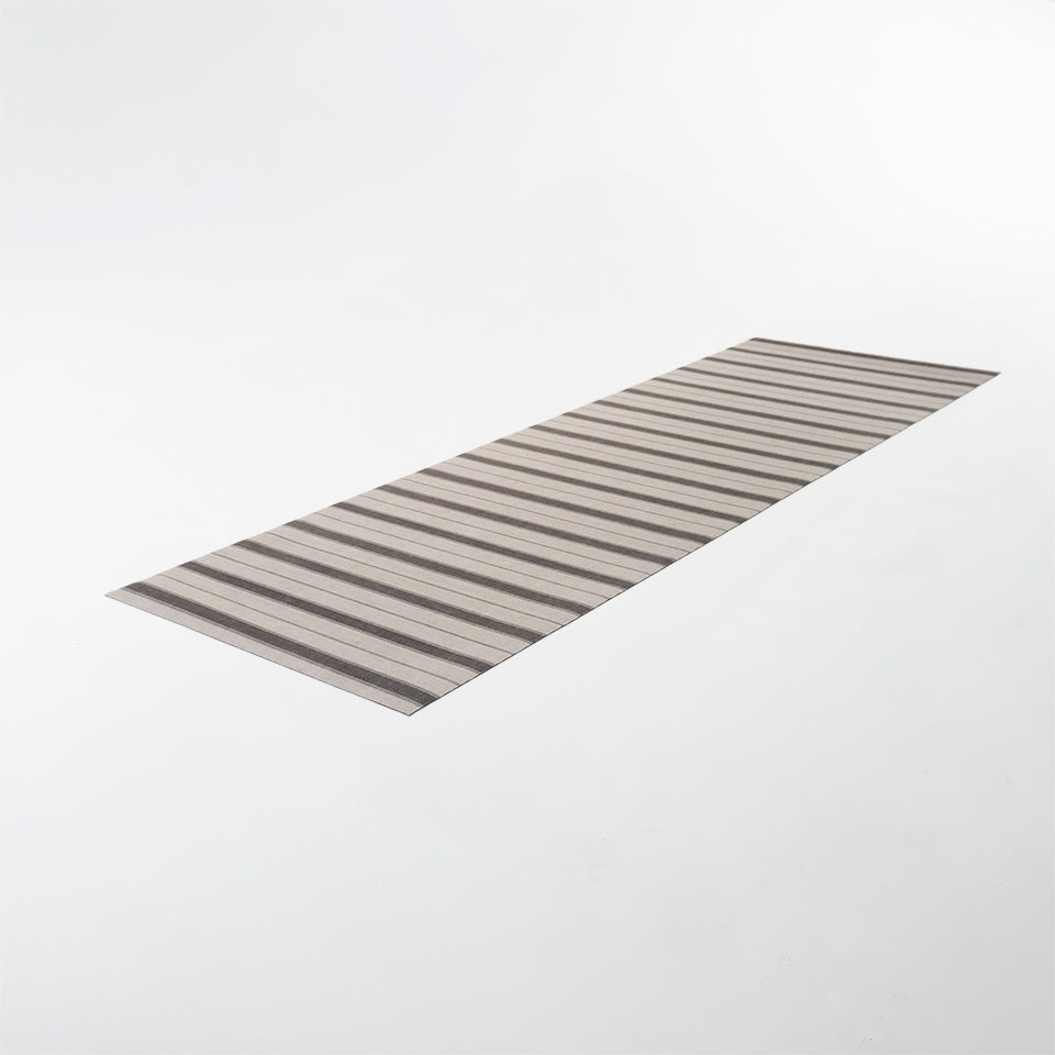 thin, long runner with neutral beige stripes in urbane bronze