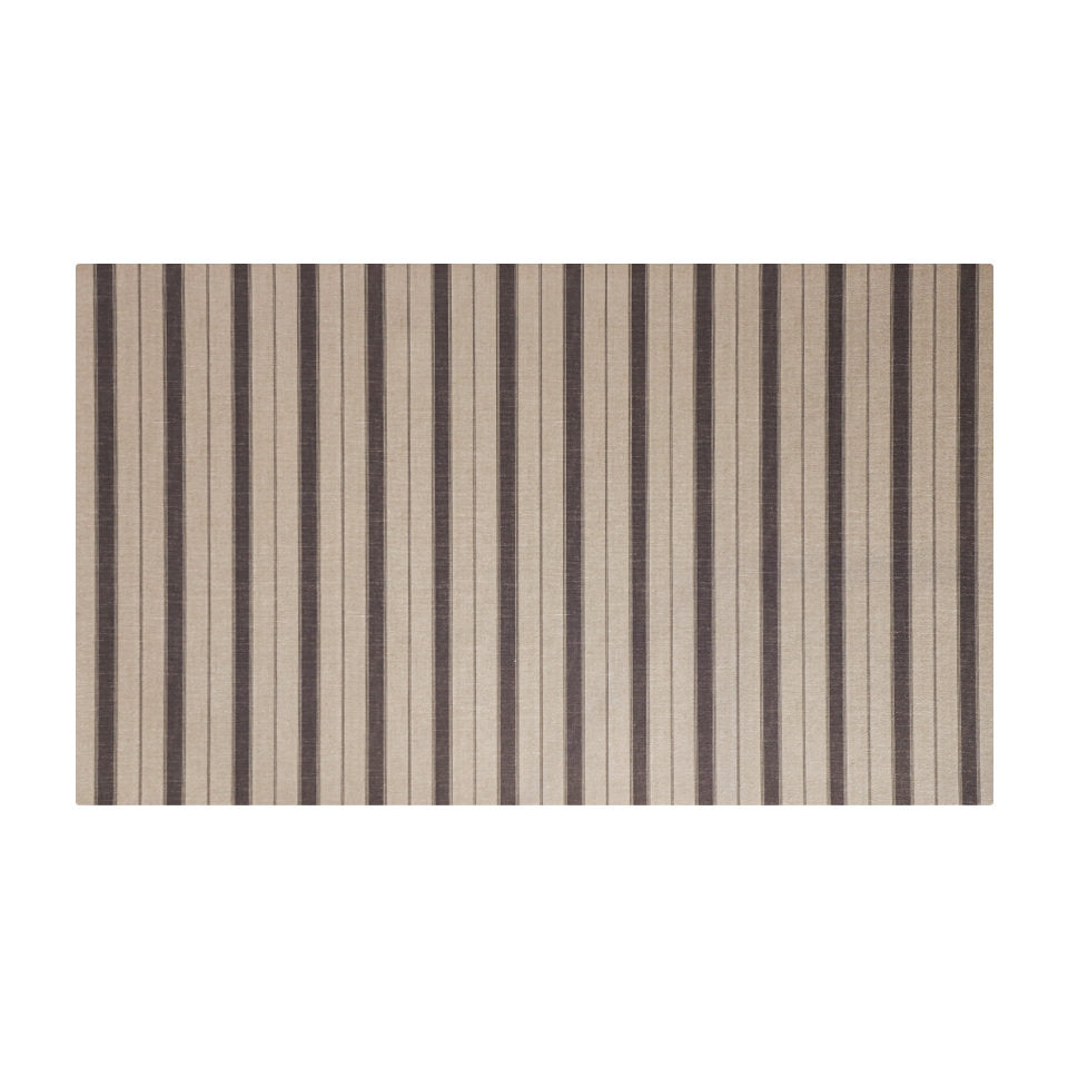 Vertical stripes across a beautiful mat in neutral tones, tan and grey.