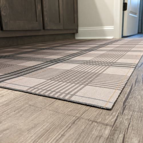 Un-Rug decorative floor mats, while thin, provide excellent traction and protection in bathrooms, kitchens, and hallways.