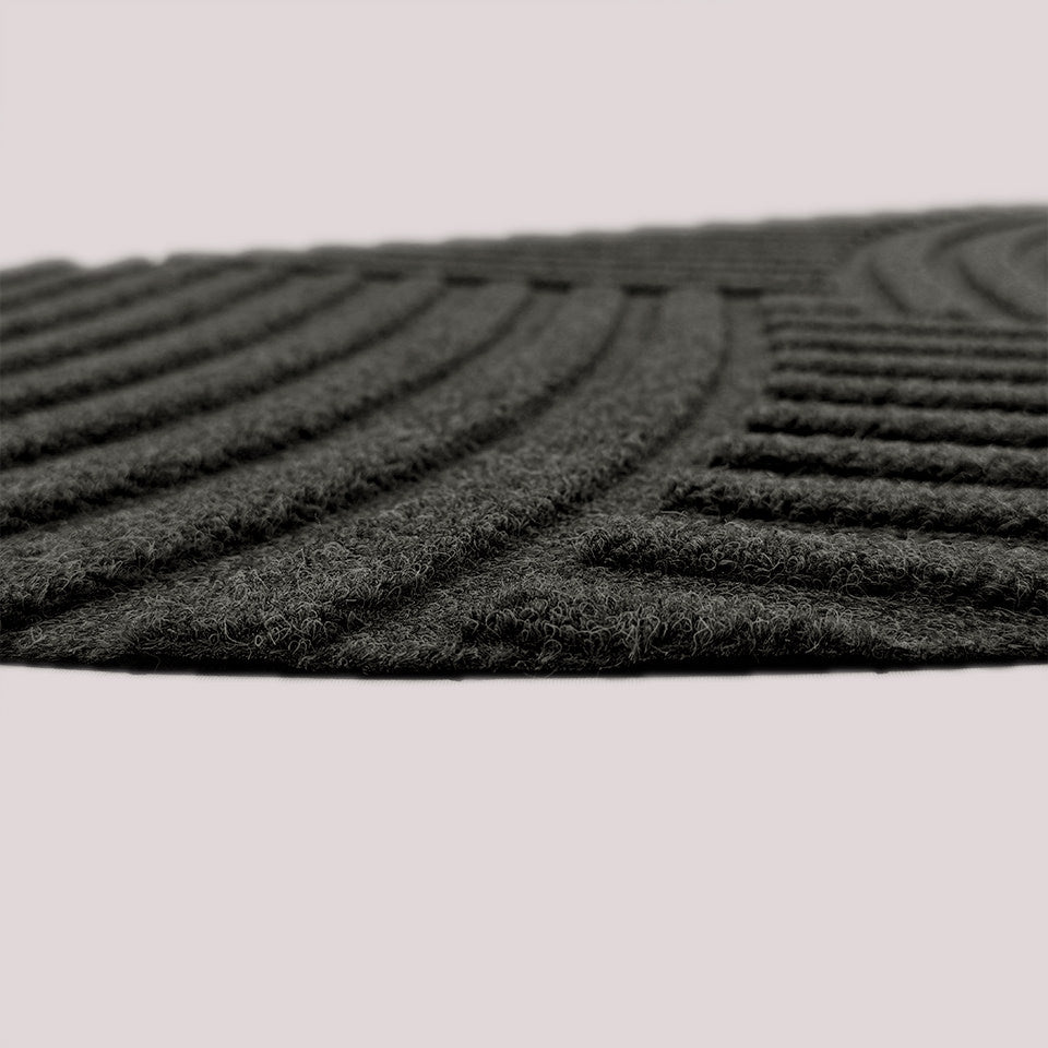 WaterHog Luxe Heartland indoor/outdoor mat showing the low profile in the color graphite.