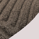 Surface detail image of WaterHog Luxe’s Heartland bi-level design and eco-friendly fabric in greige.
