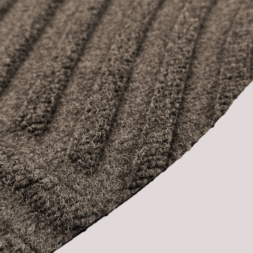 Surface detail image of WaterHog Luxe’s Heartland bi-level design and eco-friendly fabric in greige.