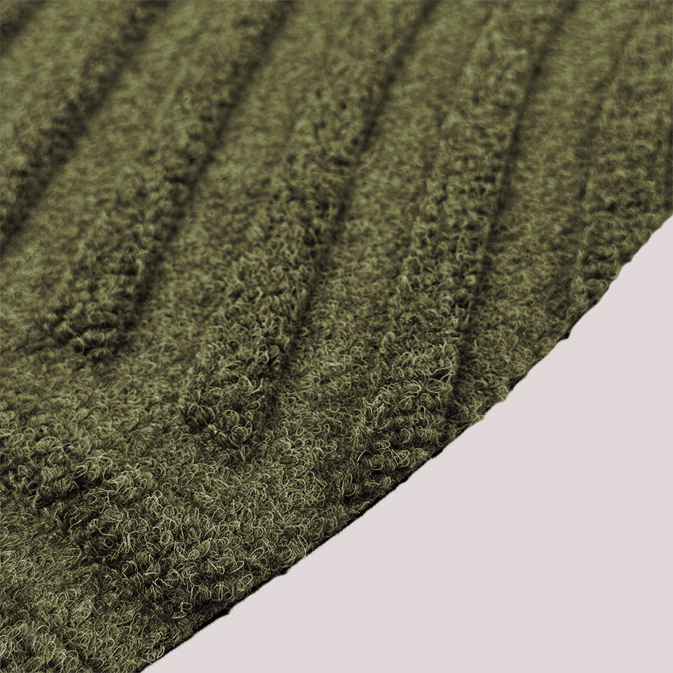 Surface detail image of WaterHog Luxe’s Heartland bi-level design and eco-friendly fabric in olive.