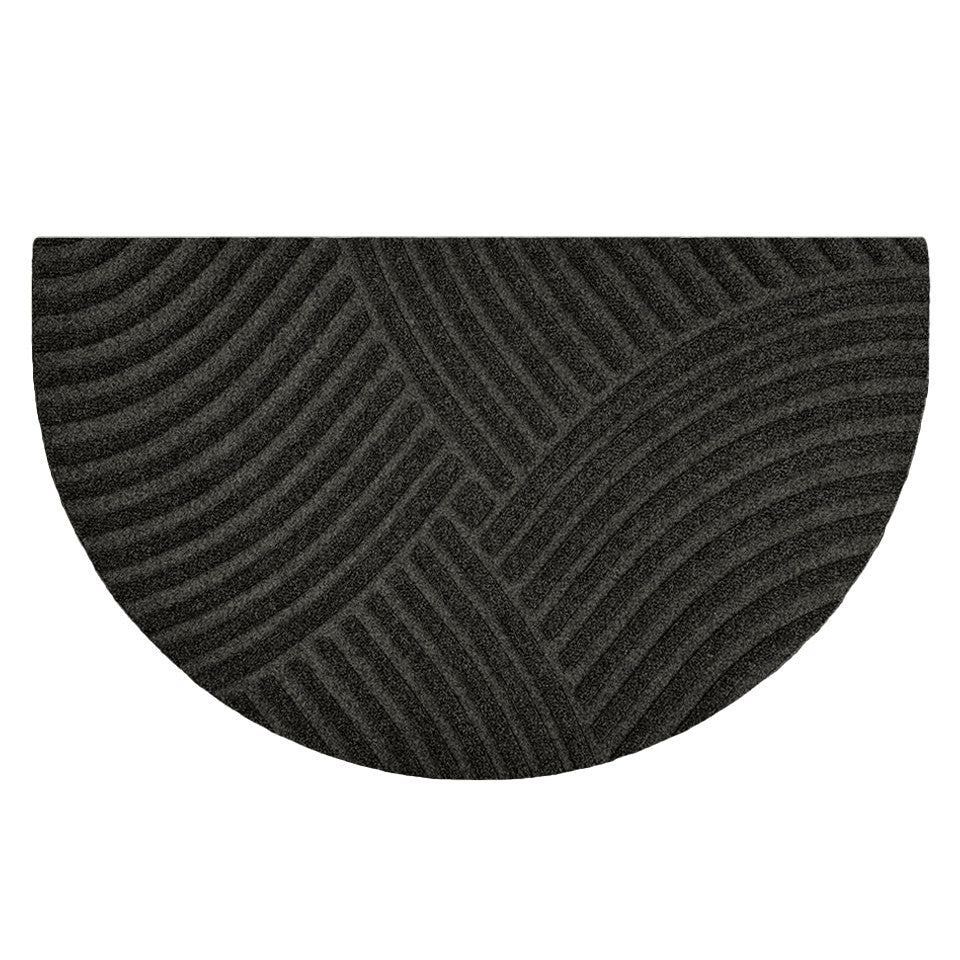 WaterHog Luxe’s Heartland design of a dreamy overlaying linear pattern crossing in the center in a dark grey, graphite color.