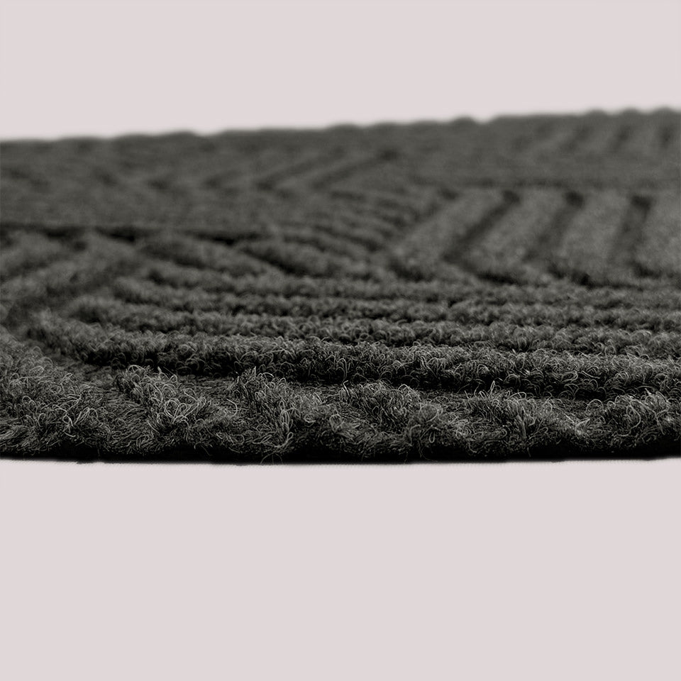 WaterHog Luxe Heymaker indoor/outdoor mat showing the non-snagging, low-profile in the color graphite.