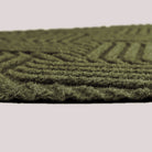 WaterHog Luxe Heymaker indoor/outdoor mat showing the non-snagging, low-profile in the color olive.
