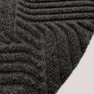 Surface detail image of Heymaker’s bi-level linear design and eco-friendly fabric construction in graphite.