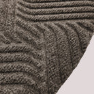 Surface detail image of Heymaker’s bi-level linear design and eco-friendly fabric construction in greige.