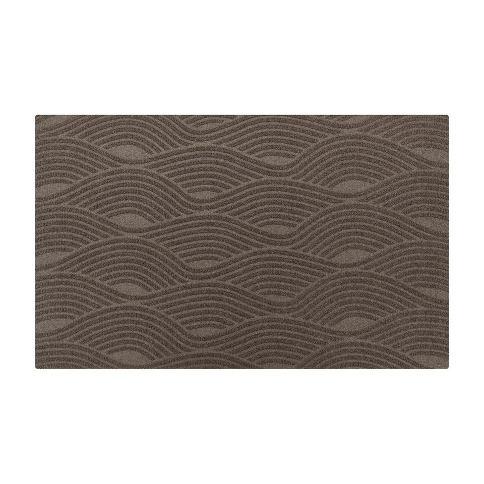 Organic lines creating a wave-like pattern on the Waves entrance doormat with bi-level non-shedding material in greige.