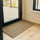 WaterHog Luxe Hourglass doormat located inside off a deck door with a low-profile.