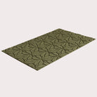 Angled image of the single-door Magnolia mat in the color olive on a creamy white background.