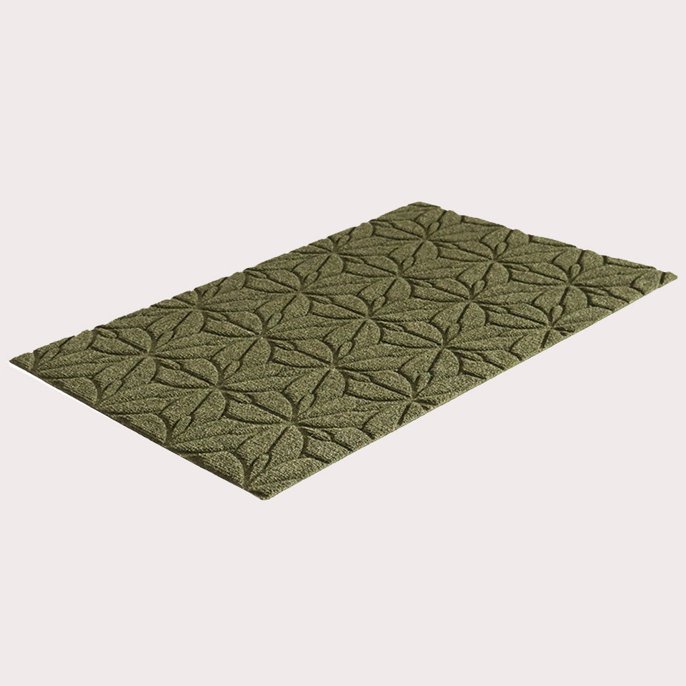 Angled image of the single-door Magnolia mat in the color olive on a creamy white background.