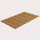 Angled image of the single-door Magnolia mat in the color wheat on a creamy white background.