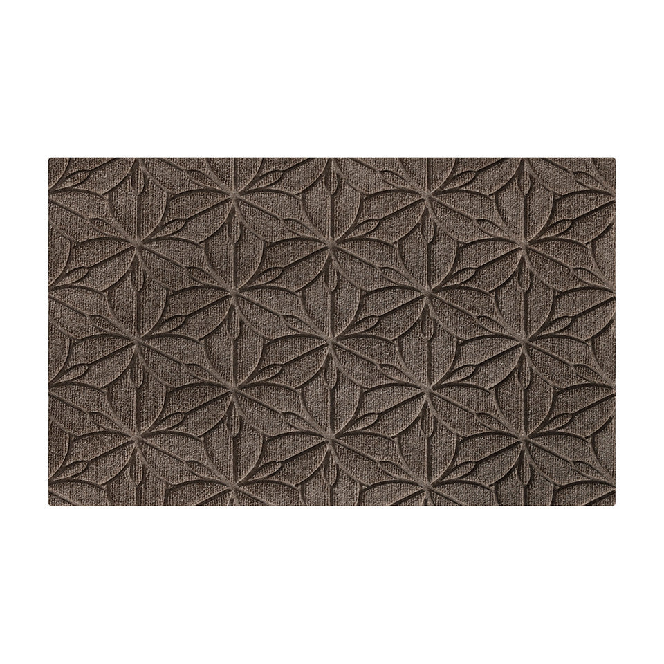Overhead image of the single-door WaterHog Luxe mat in the floral Magnolia pattern and greige color, consisting of a chalky grey with beige undertones.