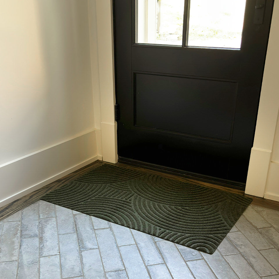 Olive Put Your Records On single door all-weather mat at the side entrance of a home