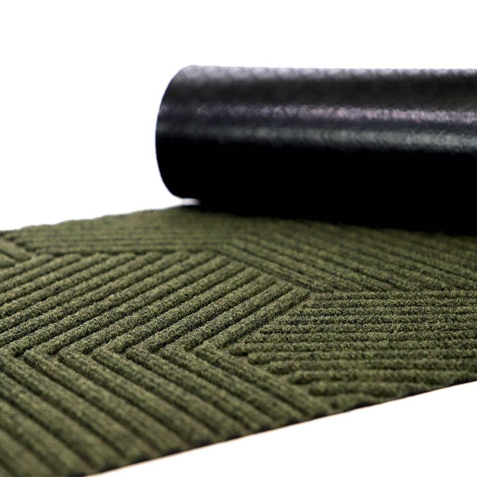 Zephyr doormat in olive green showing rubber backing which helps prevent slips and trips