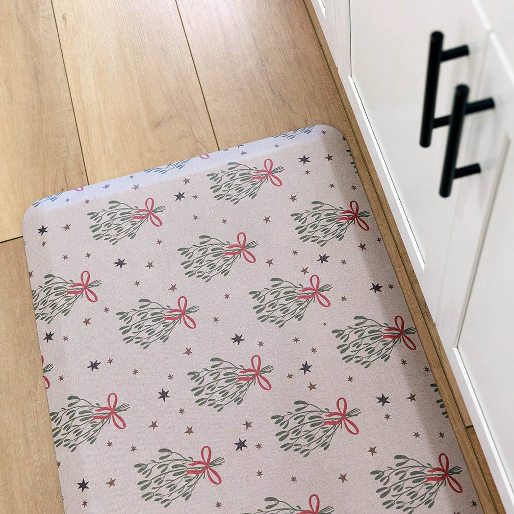 Merry Mistletoe Christmas anti-fatigue kitchen mat with wipeable surface and winter holiday design for kitchen comfort.
