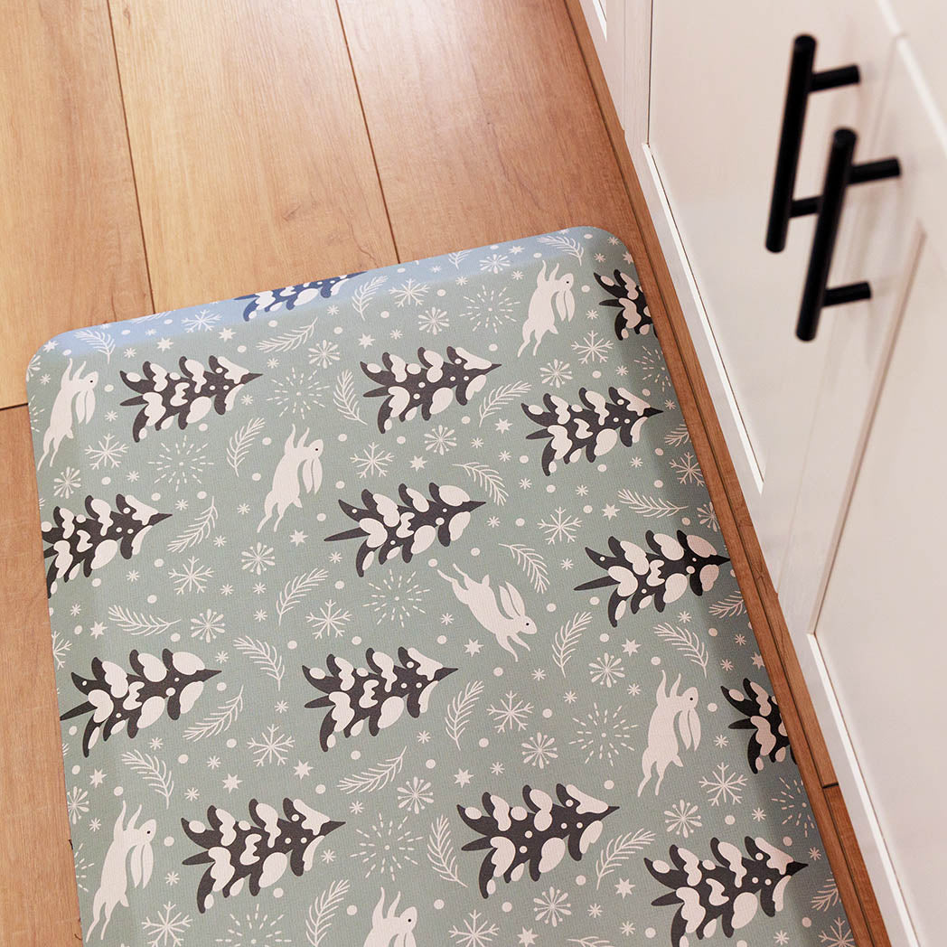 Snow Bunny fall anti-fatigue kitchen mat with wipeable surface and winter holiday design for kitchen comfort.