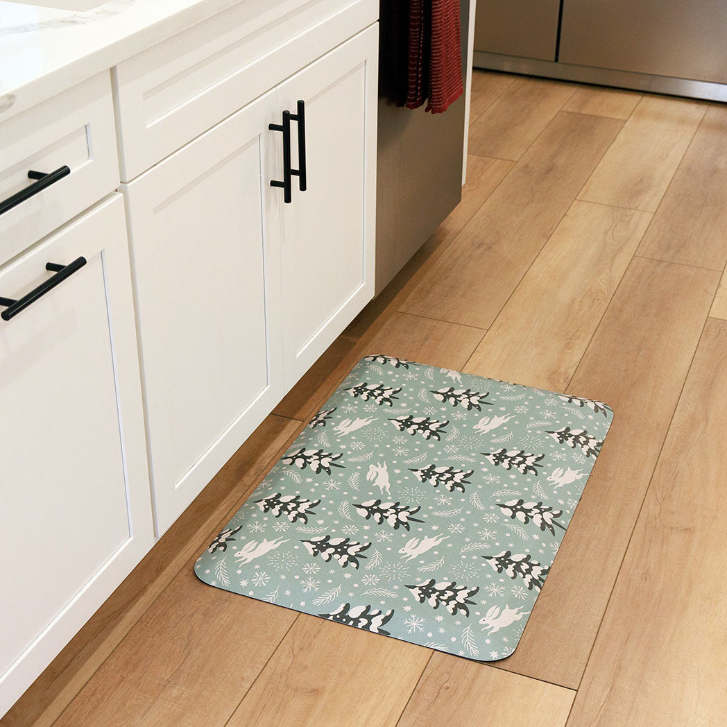 Snow Bunny fall anti-fatigue kitchen mat with wipeable surface and winter holiday design for kitchen comfort.