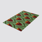single door sized buttercups doormat in light green and berry (deep red) colors