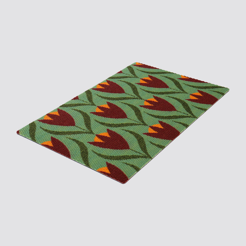 single door sized buttercups doormat in light green and berry (deep red) colors