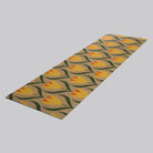 Coir and yellow Buttercups double doormat laying on white surface