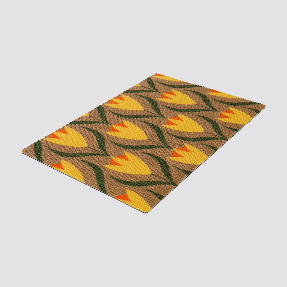 single sized coir and yellow buttercups doormat on white background