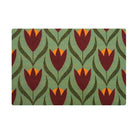 single door buttercups doormat in colors light green, dark green, berry (deep red), and orange