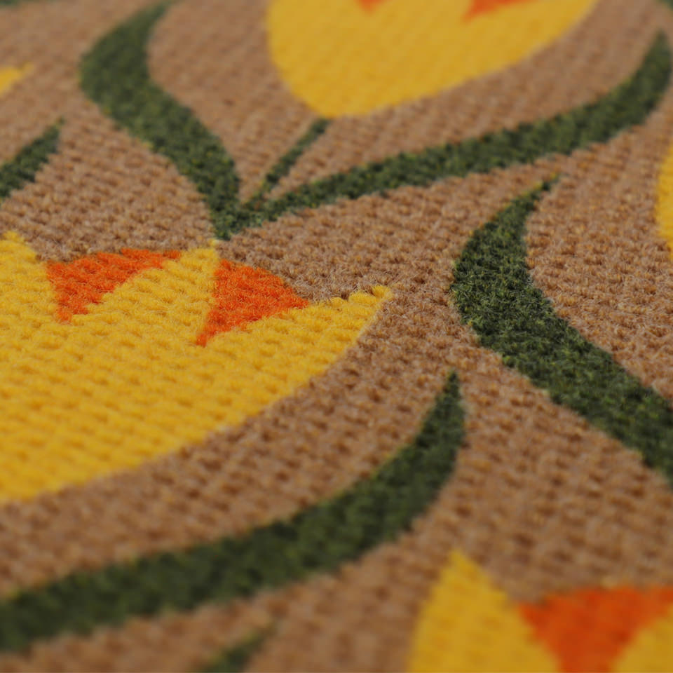 close up view of floral pattern showing color vibrancy and texture of mat