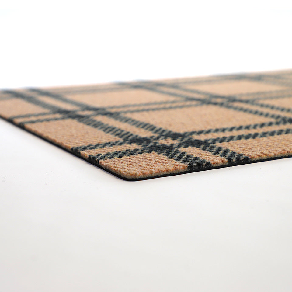 Low-profile doormat in black and yellow plaid colors will allow doors to pass over easily. 