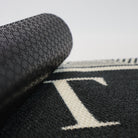 High quality doormats like the Escher Monogrammed doormat have a durable rubber back that will not rot or fall apart like cheap coco welcome mats.