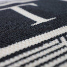 Unique textured surface of the Escher Monogrammed doormat scrapes shoe and captures mud and water; will not shed or rot like coco mats.