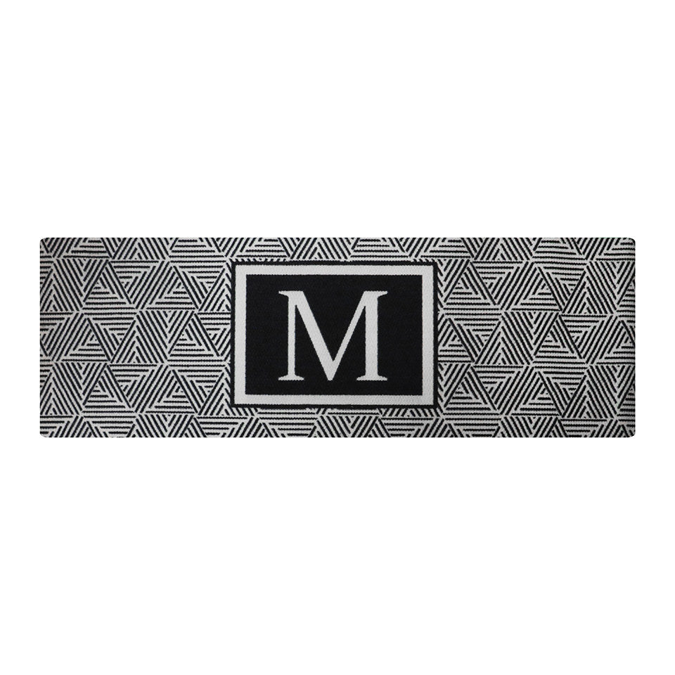 double door size monogrammed escher doormat in white and black
