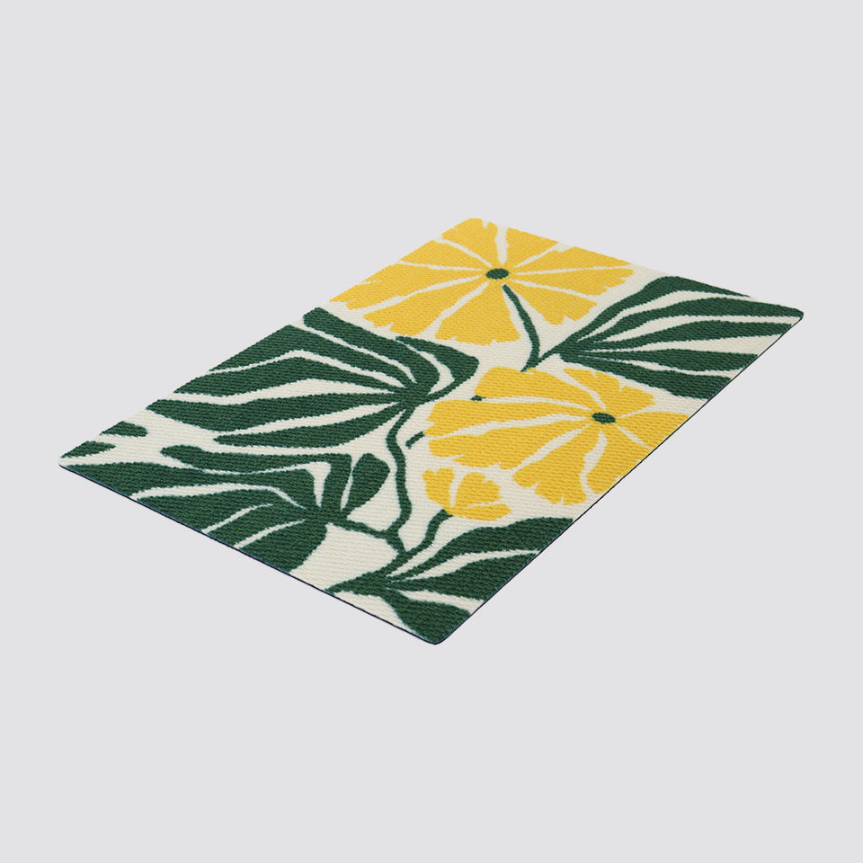 Isolated shot of green and yellow floral botanical doormat