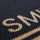 Close up of non shedding doormat personalized with last name