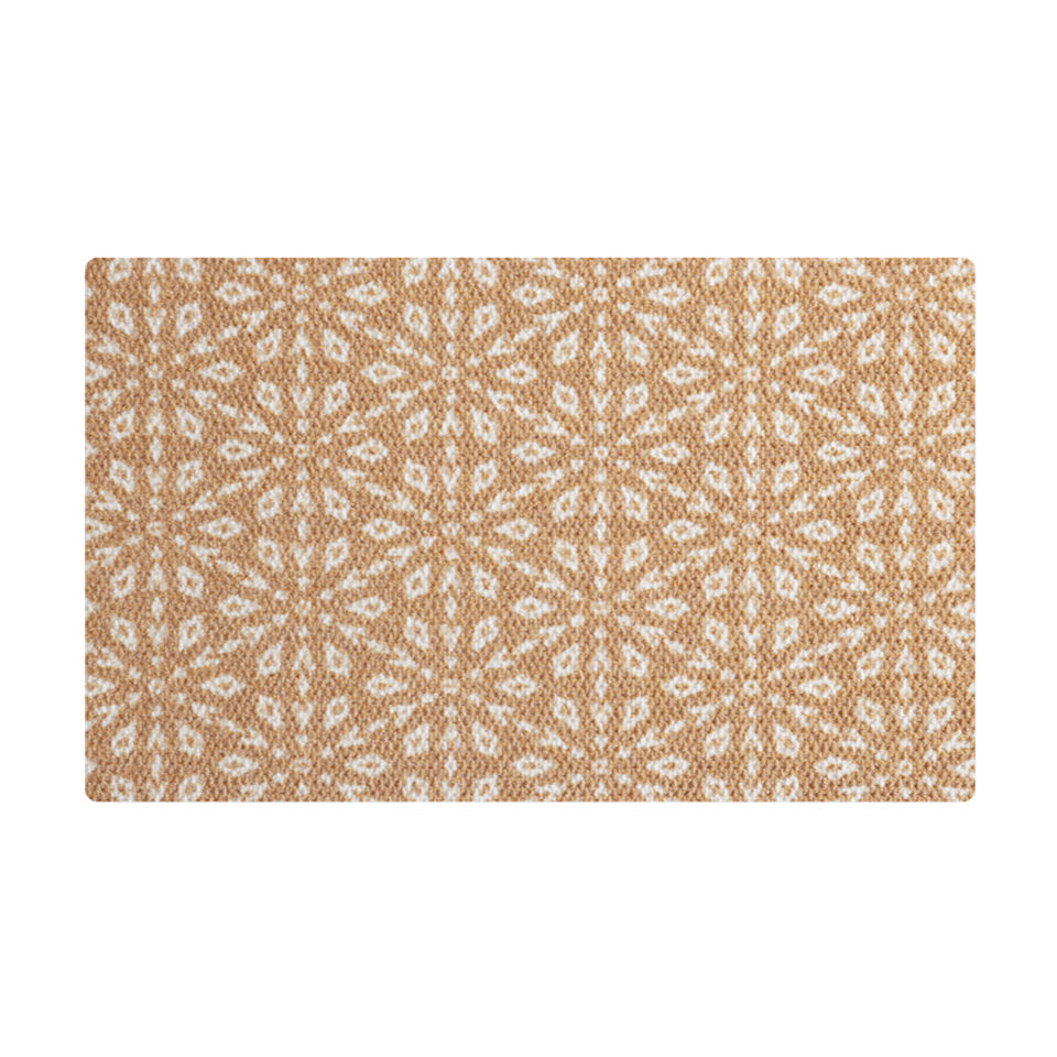 Coir holiday winter doormat with white snowflakes in circle pattern