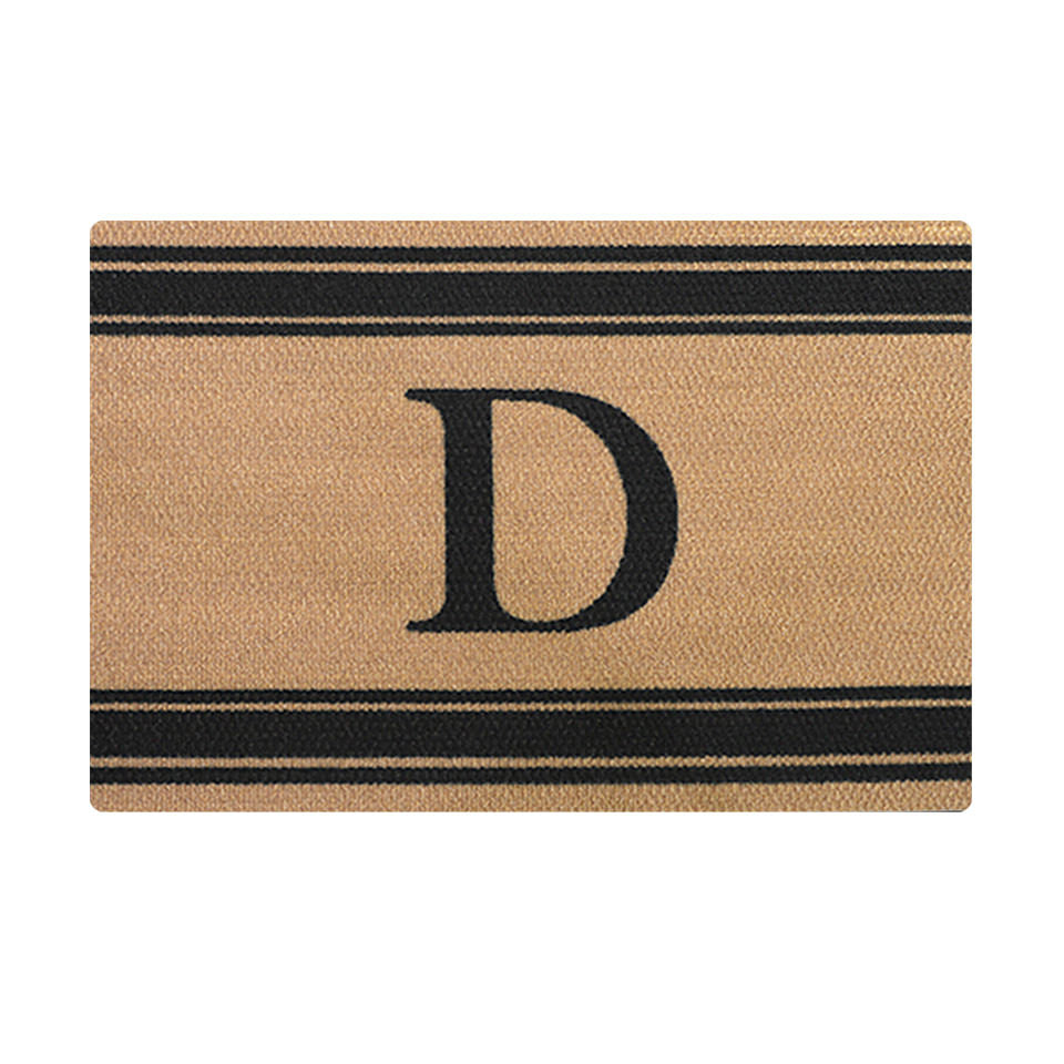 Monogrammed doormat in Wheat with black monogram and black stripes at top and bottom