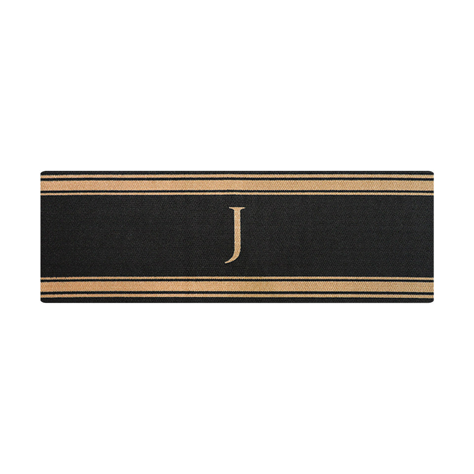 Tan and black striped double door sized doormat with tan monogram in center