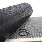 Close up of rubber backing on personalized house number doormat in grey