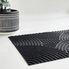 Put Your Records On single door doormat in graphite is a durable mat with a modern pattern.  An all-weather and low-profile doormat that can be used inside or outside. Made in the USA.