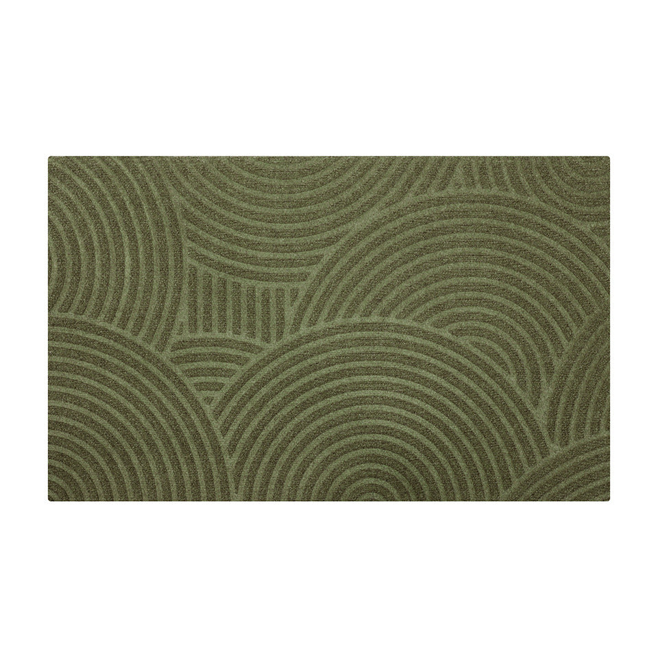 Olive colored circular geometric styled doormat for single door